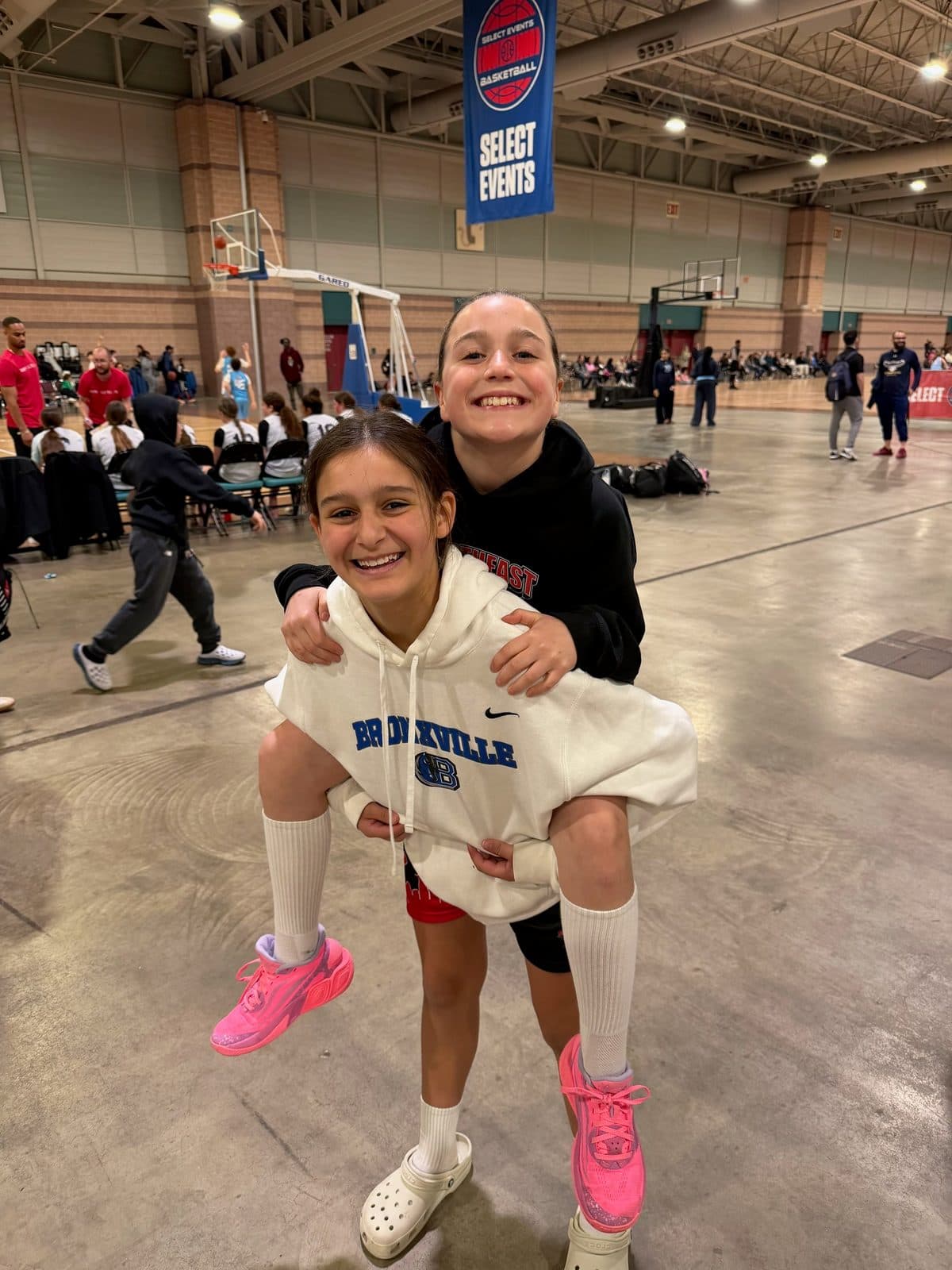 Two BYBA girls having fun together at a tournament