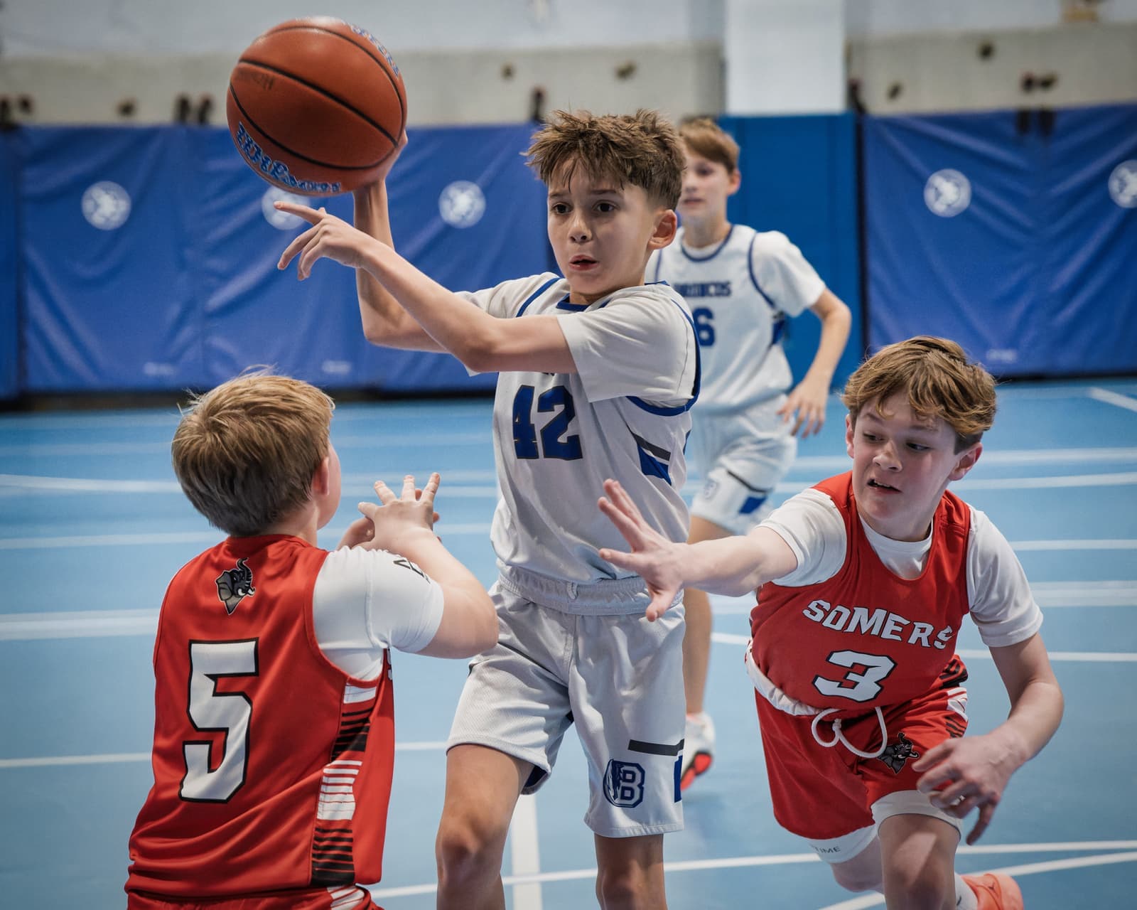 A Bronco passing out of a double team against Somers