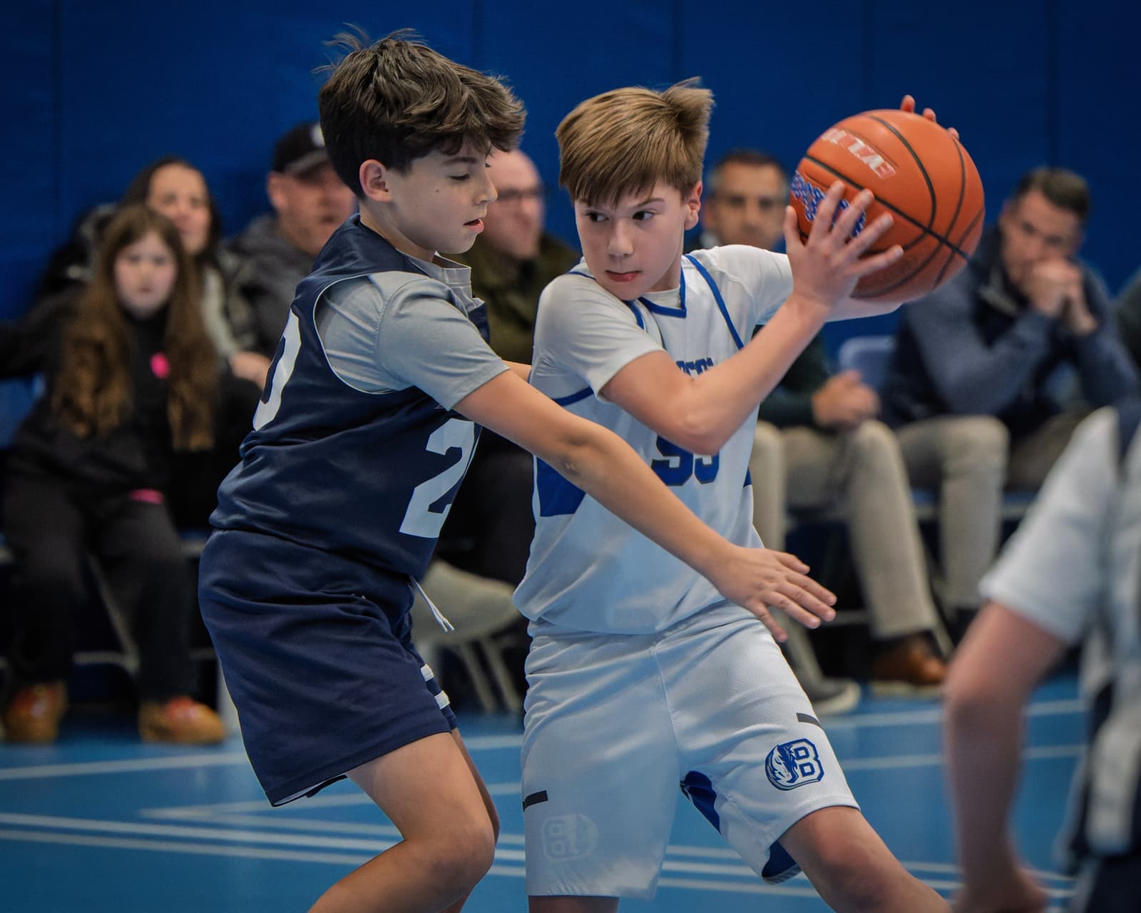 A Bronco protecting the ball in the post
