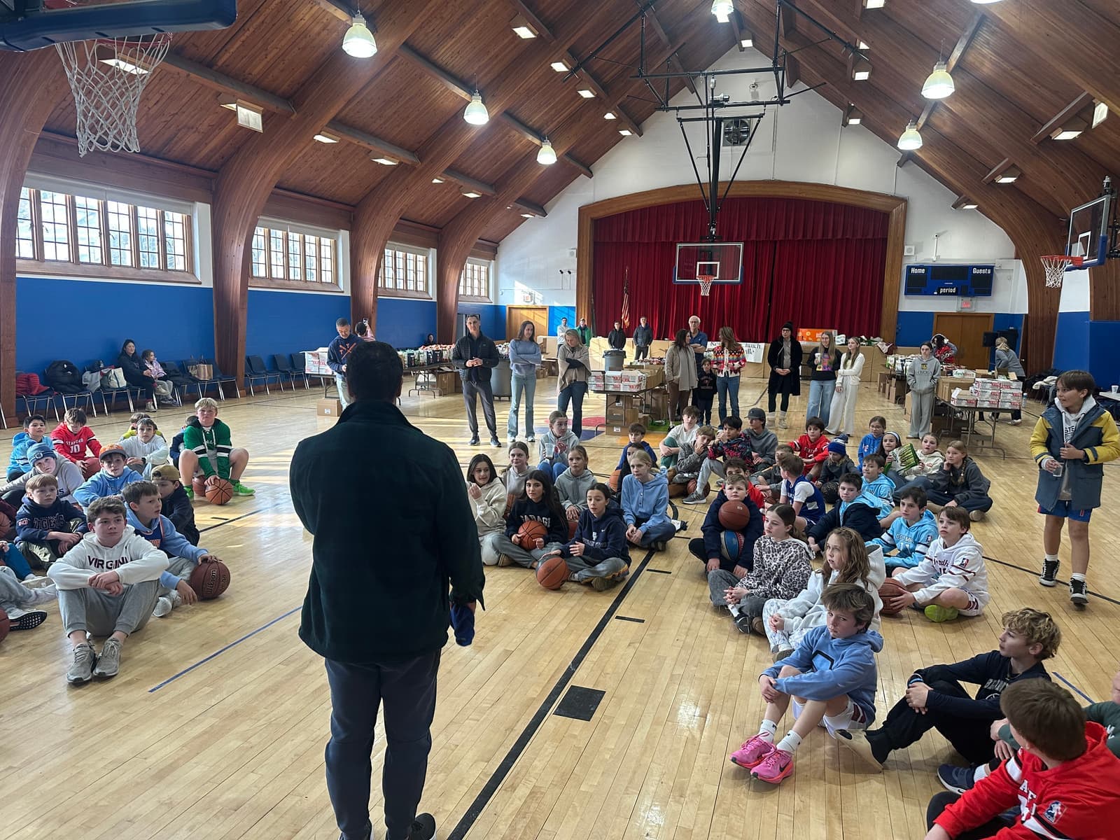 BYBA players gathered on the court at the Reformed Church of Bronxville for the service project kickoff