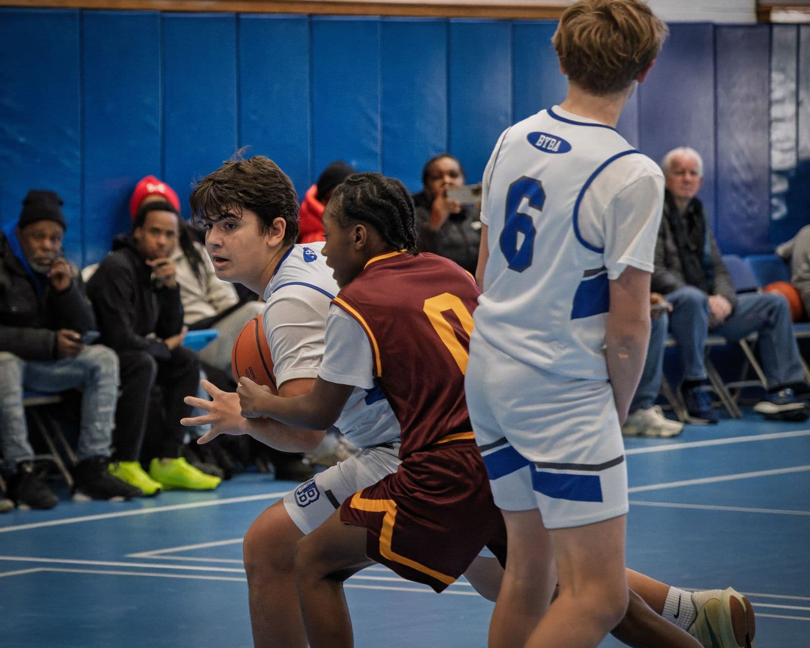 BYBA boys driving to the basket in a travel game