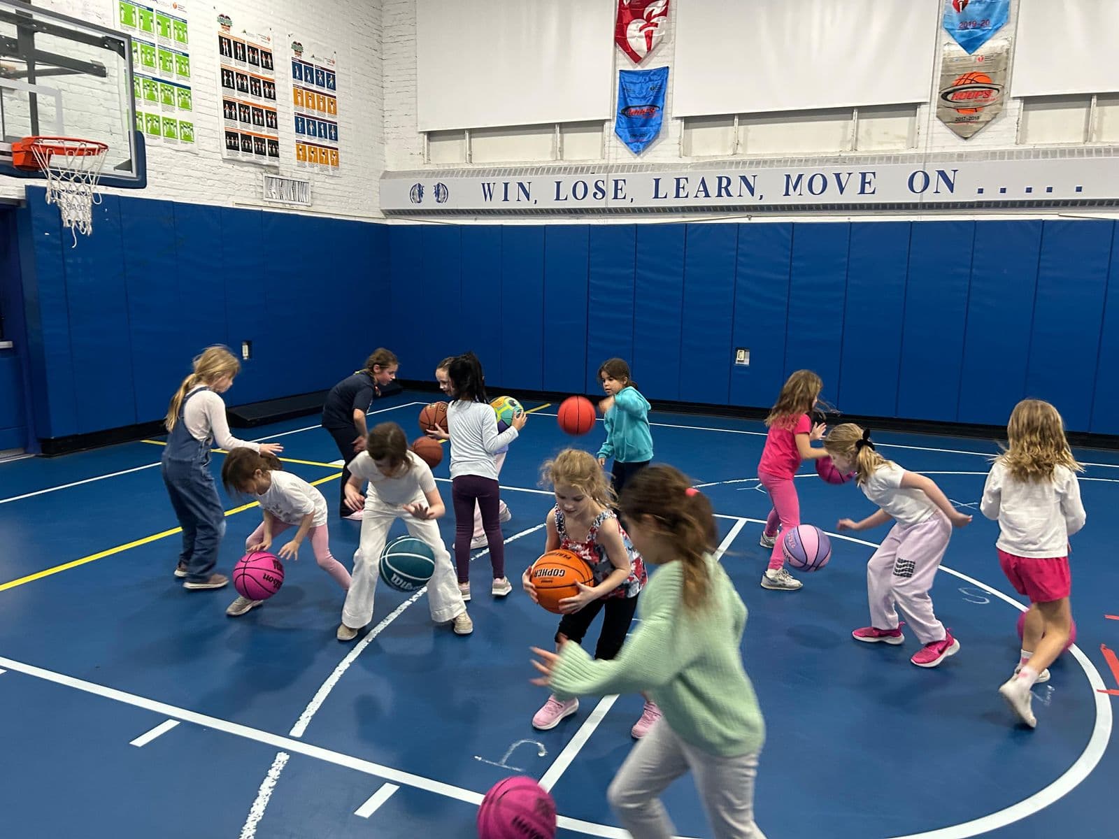 Girls working on dribbling at a BYBA clinic